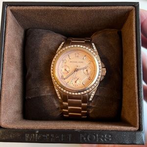 Women’s Michael Kors rose gold watch
